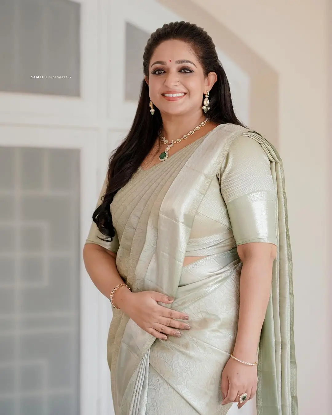 Kavya Madhavan in Green Saree Blouse